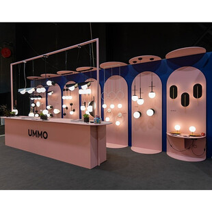 Kinkiet biało-mosiężny Ummo Rokke - Elegancki design