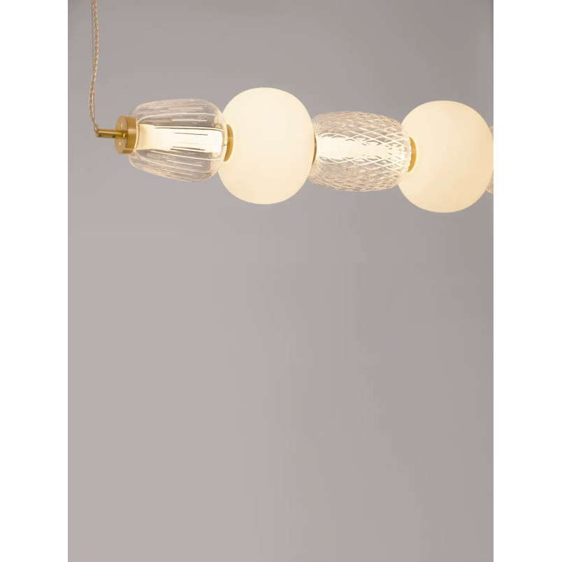 Lampa wisząca podłużna glamour z dekoracyjnym szklanym kloszem Scanzo 110cm LED 3000K złoty połysk / opal / transparent
