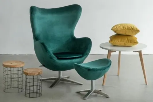 Designerski zielony fotel obrotowy Jajo z podnóżkiem